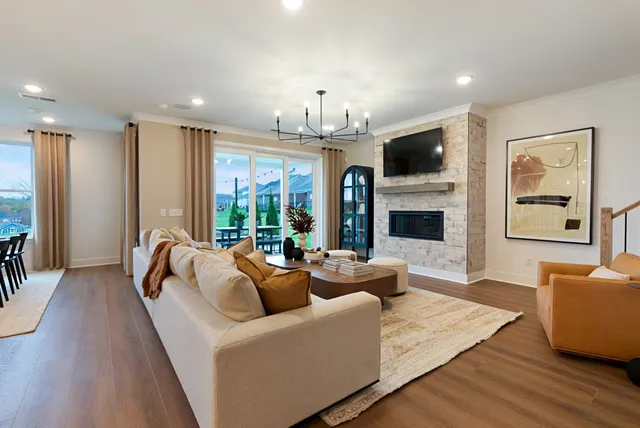 a bedroom with a bed and a table