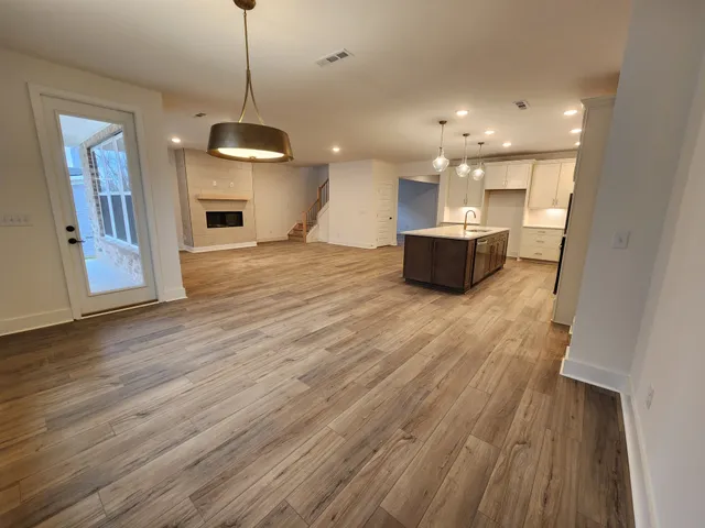 a view of a hallway with a large window