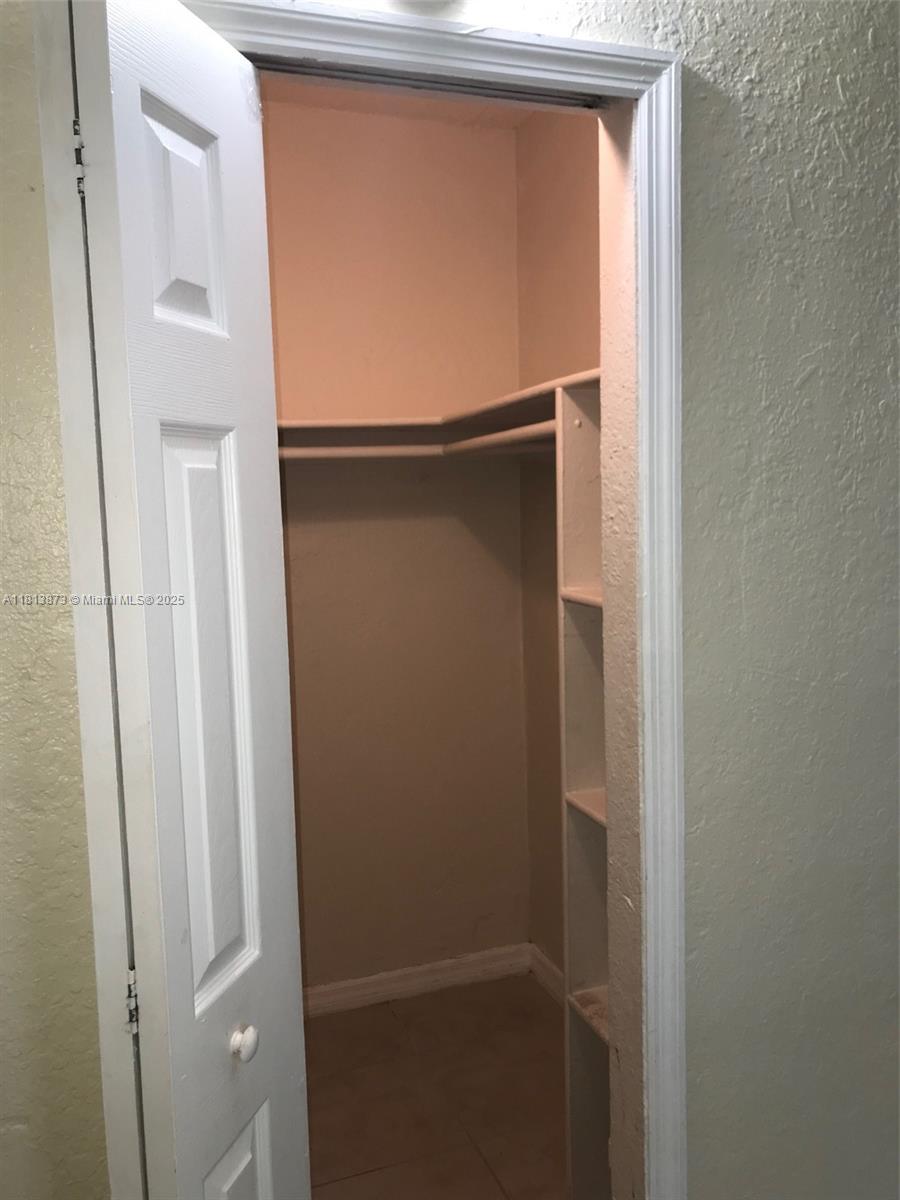 Flagami Miami, FL 33126 - Photo 7 of 9 a bathroom with a glass shower door