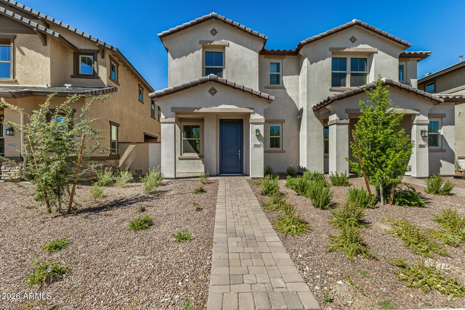 20618 West Thomas Road Buckeye, AZ 85396 - Photo 33 of 38 front view of a house with a yard
