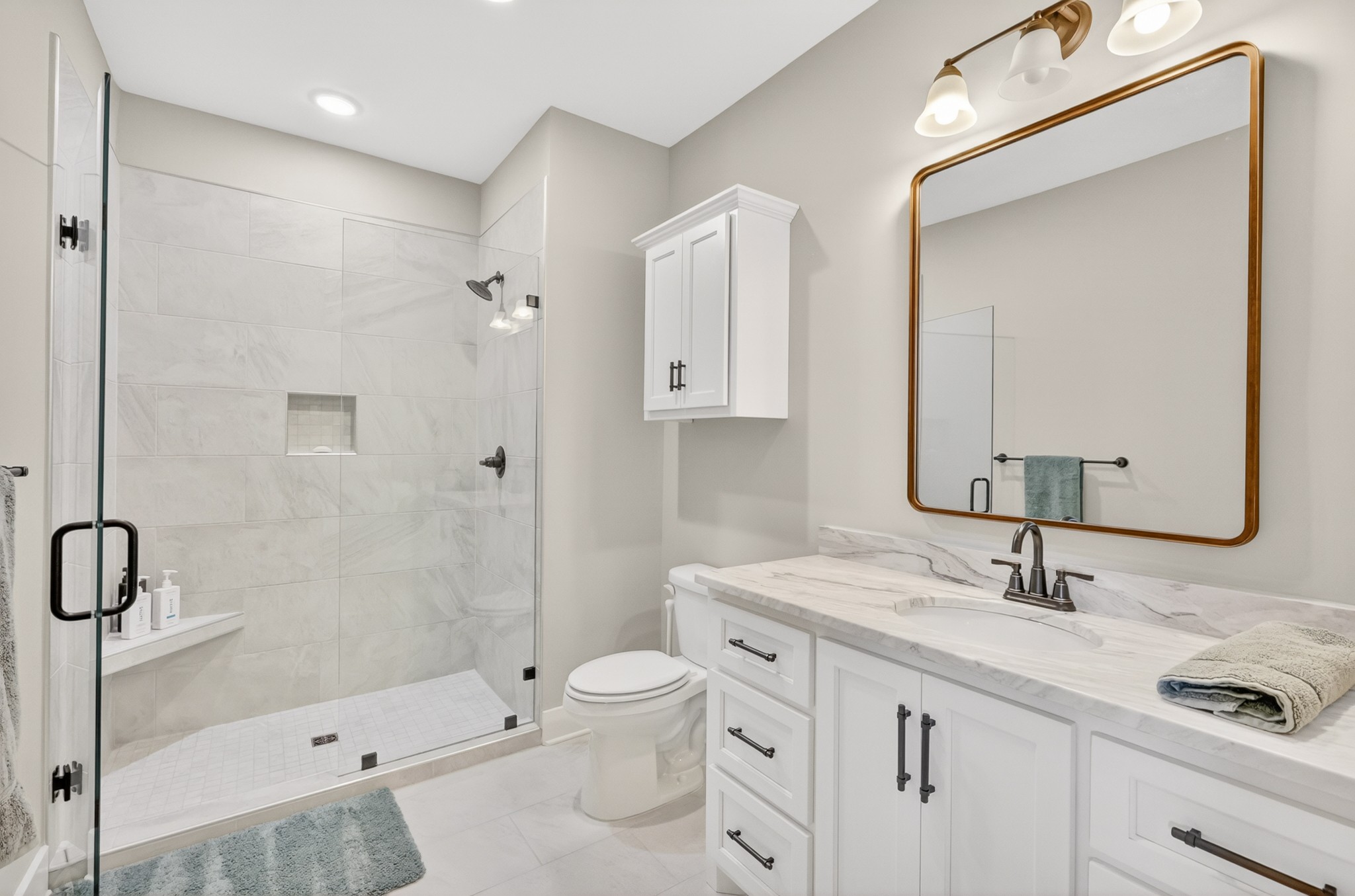 1176 Iron Bridge Road Columbia, TN 38401 - Photo 42 of 53 a bathroom with a sink a toilet and shower