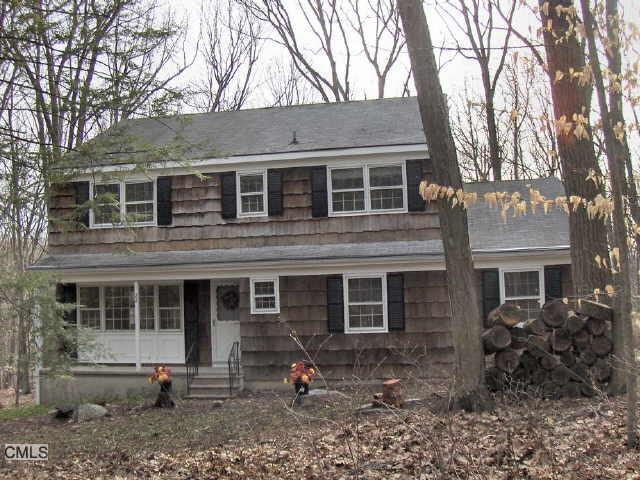 22 Deer Run Road Brookfield, CT 06804 - Photo 1 of 1 a front view of a house with garden