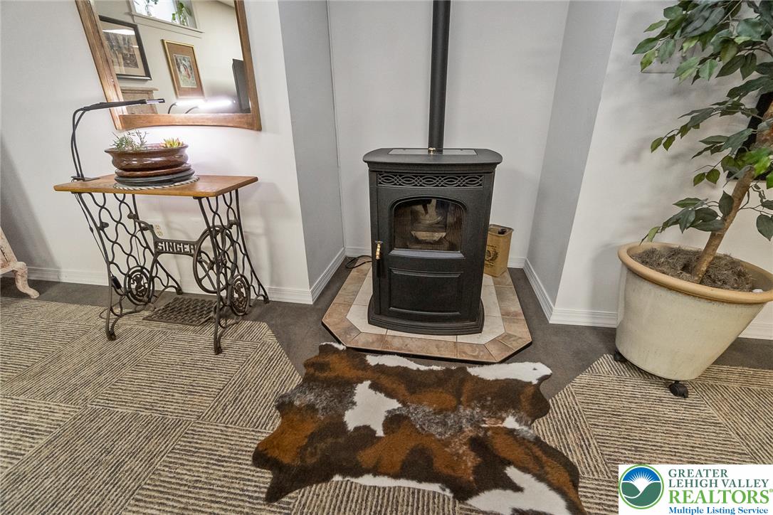 540 Briar Road Pen Argyl, PA 18072 - Photo 57 of 66 A freestanding stove offers warmth on movie night