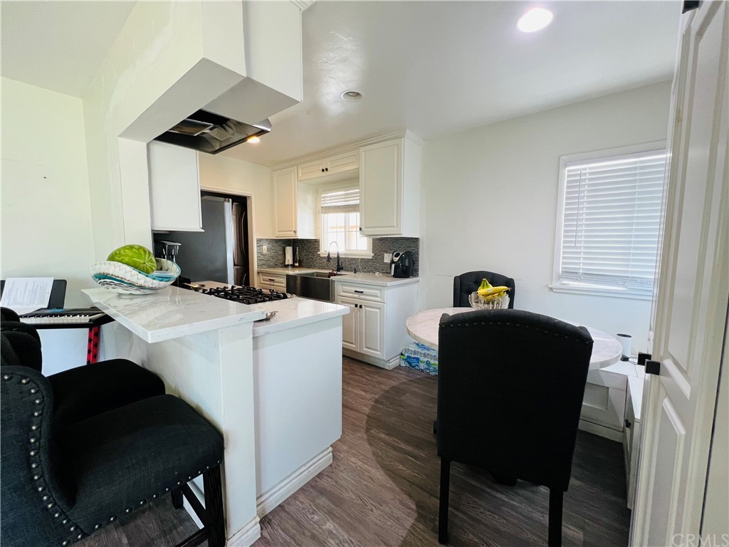 1946 Minnesota Street Riverside, CA 92507 - Photo 1 of 1 a living room with furniture and a chair