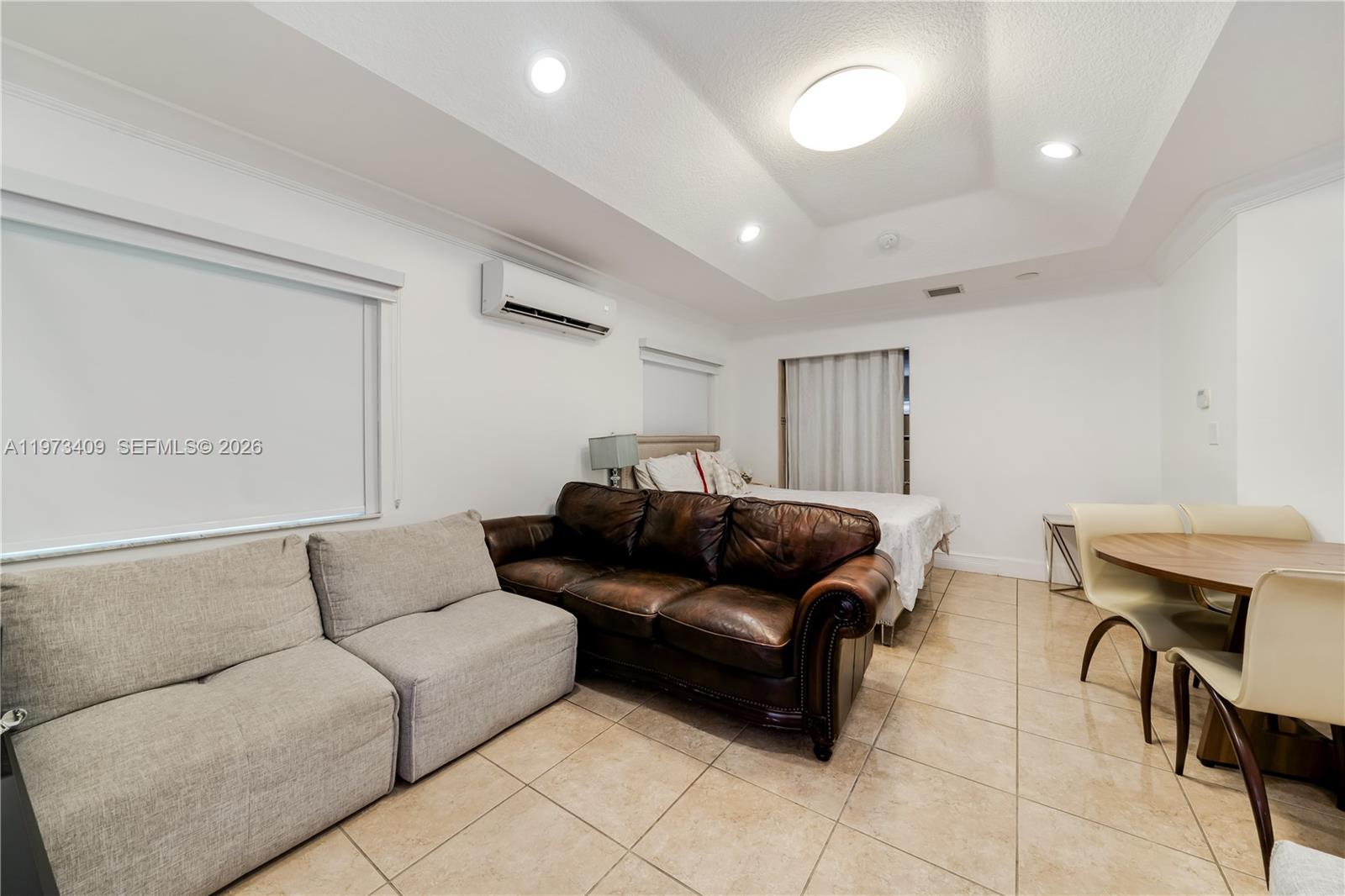 13050 Southwest 26th Street Miami, FL 33175 - Photo 26 of 43 a living room with furniture and a couch
