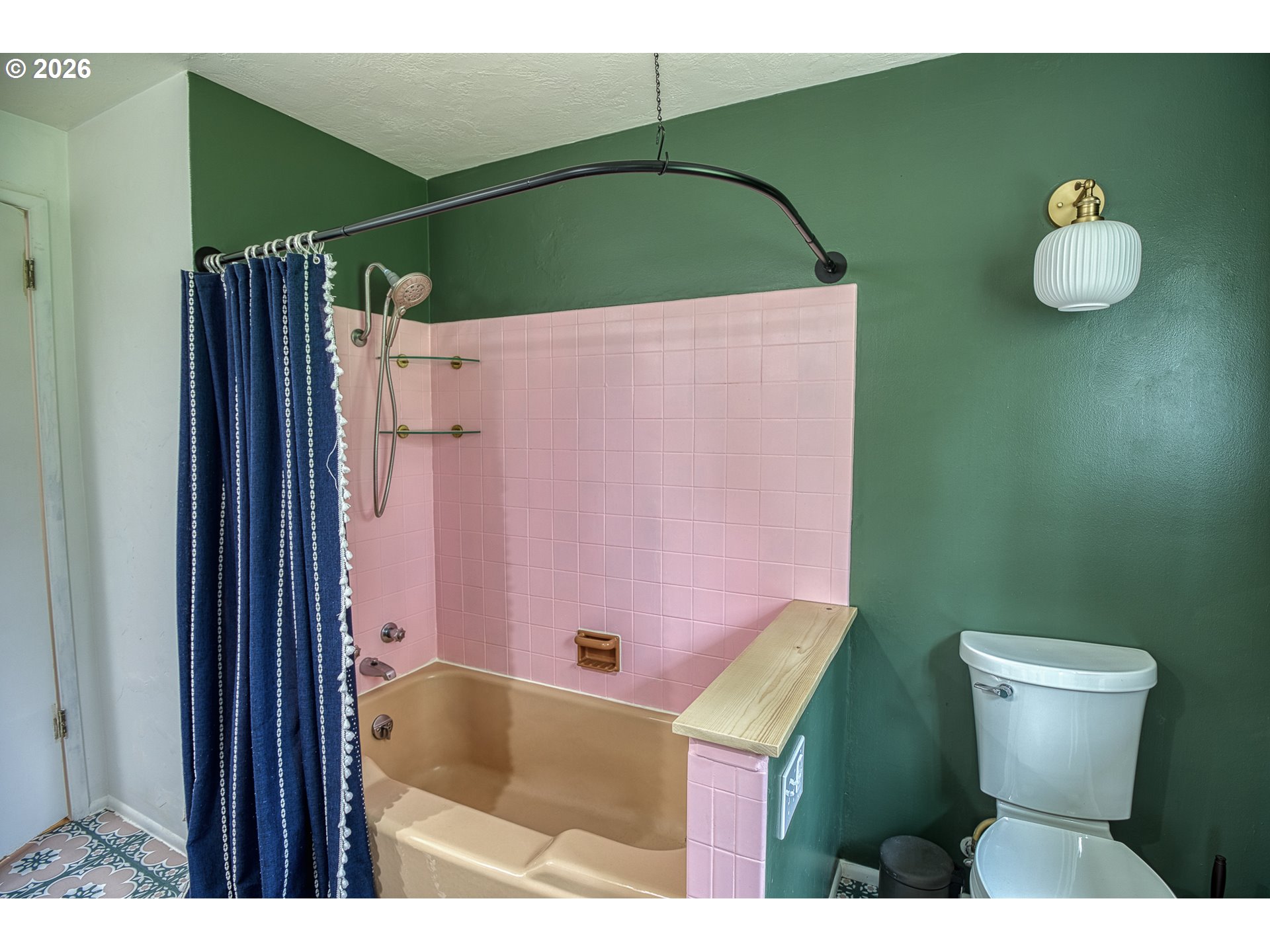 7077 Main Street Springfield, OR 97478 - Photo 18 of 34 a bathroom with a sink mirror and toilet