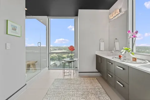 a kitchen with sink and cabinets