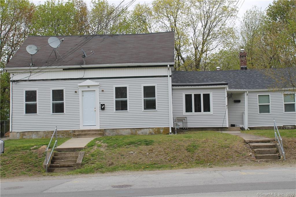 80 Furnace Street Killingly, CT 06239 - Photo 1 of 1 a front view of a house with a garden