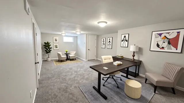 a workspace with furniture and white walls