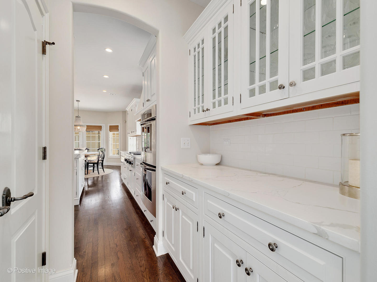 308 North County Line Road Hinsdale, IL 60521 - Photo 20 of 40 a view of a kitchen with furniture and wooden floor