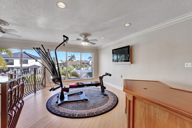 a large bedroom with a large bed and a large window