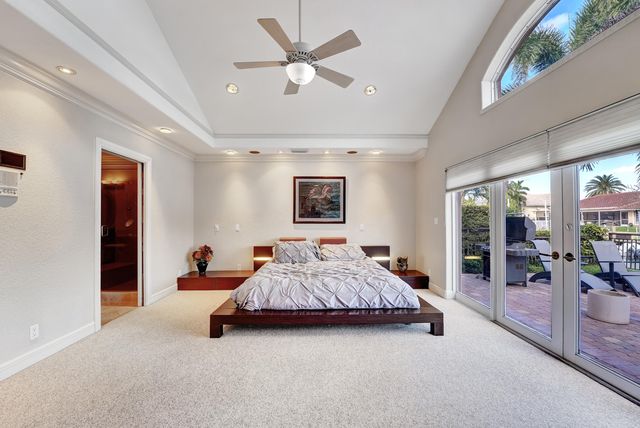 a view of a house with a small deck