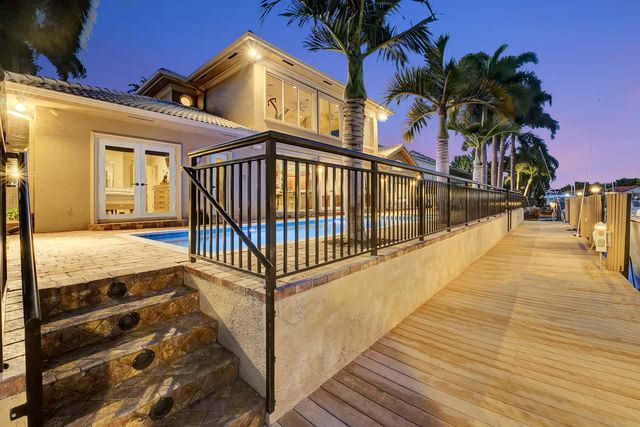 an aerial view of a house yard and a sitting area