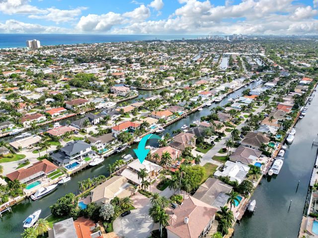 a view of a chairs and table in the patio