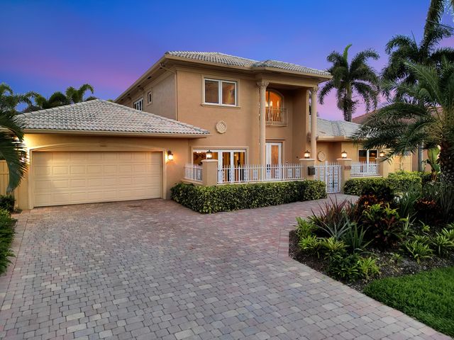 a view of a chairs and tables in patio