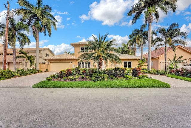 a view of a balcony with wooden floor