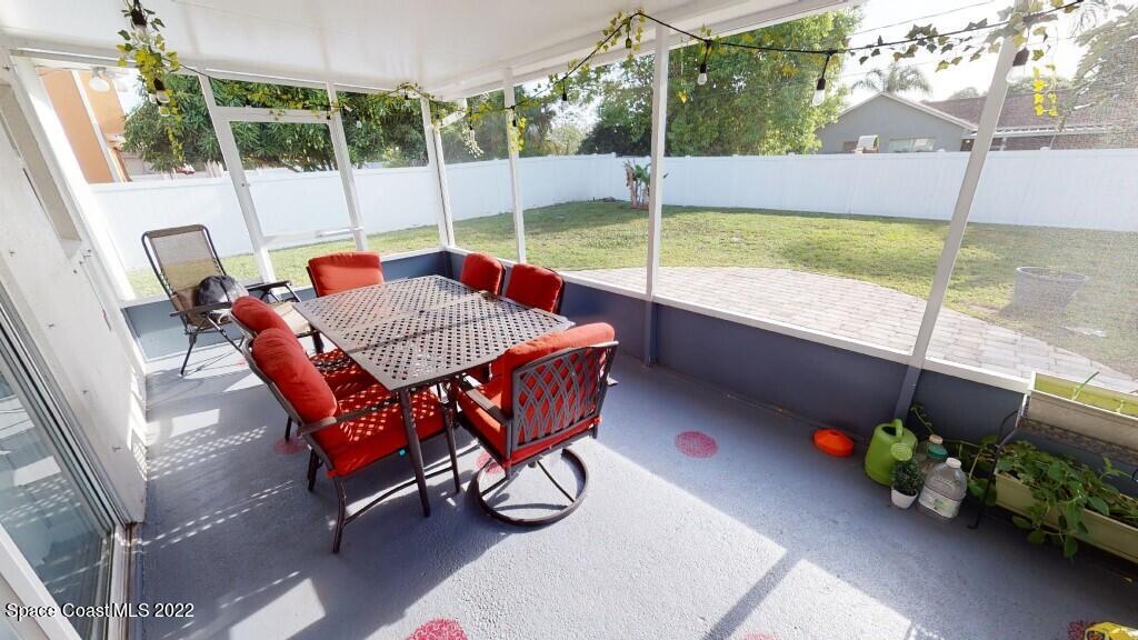 2343 Angel Road Palm Bay, FL 32909 - Photo 23 of 28 a view of an outdoor sitting area with furniture