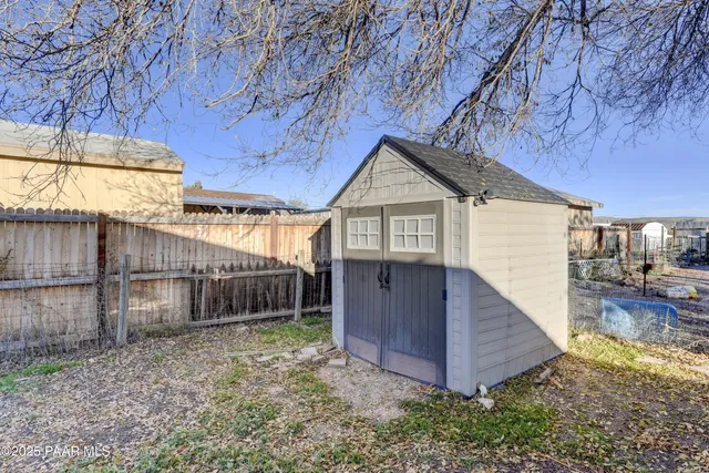 a view of backyard with green space
