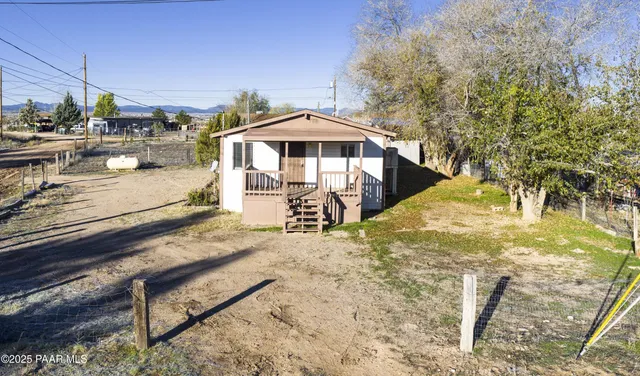 a view of a yard with an outdoor space
