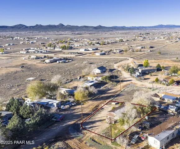 a view of an ocean and a mountain