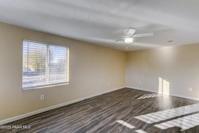 a view of a livingroom with a window