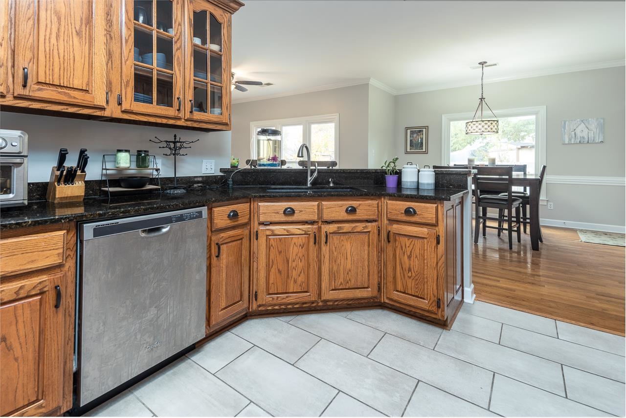 982 Handforth Cove Collierville, TN 38017 - Photo 11 of 25 a kitchen with stainless steel appliances granite countertop a sink and cabinets