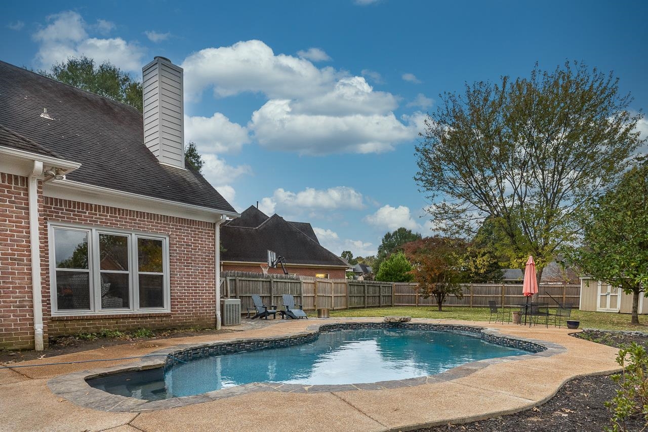 982 Handforth Cove Collierville, TN 38017 - Photo 21 of 25 a view of a house with swimming pool and sitting area