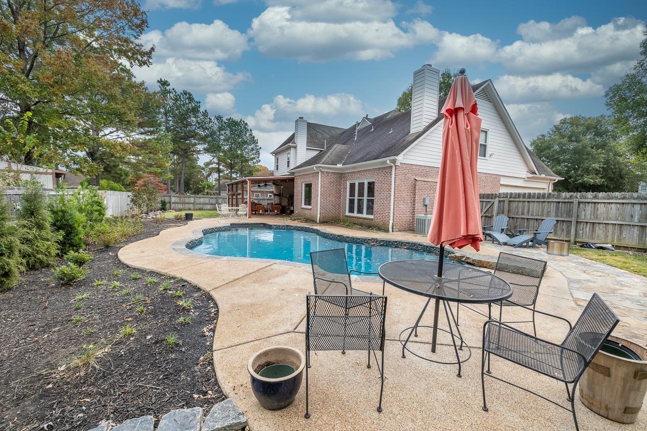 982 Handforth Cove Collierville, TN 38017 - Photo 23 of 25 a view of a house with backyard and sitting area