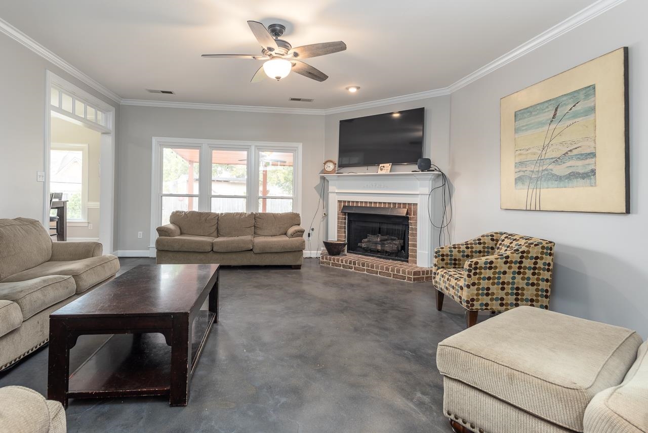 982 Handforth Cove Collierville, TN 38017 - Photo 7 of 25 a living room with furniture and a fireplace
