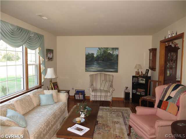 13153 Depot Road Hanover, VA 23069 - Photo 3 of 24 a living room with furniture and a large window