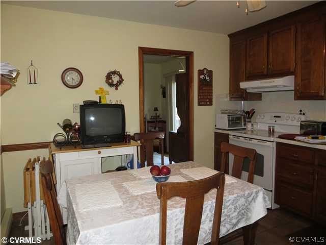 13153 Depot Road Hanover, VA 23069 - Photo 6 of 24 a kitchen with a sink a stove and refrigerator