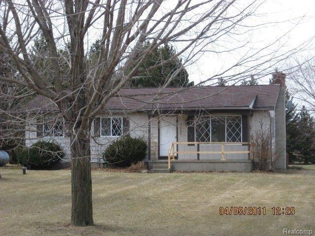 7102 Hinchey Road Pinckney, MI 48169 - Photo 1 of 14 Front