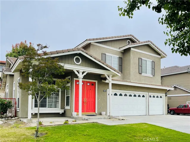 a front view of building with yard