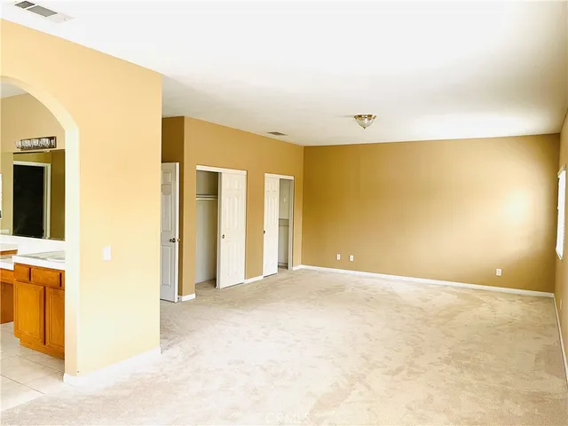 a view of livingroom with kitchen