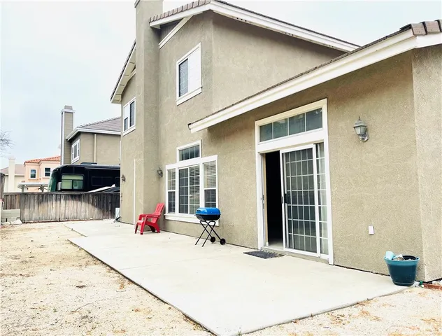 a house view with a outdoor space