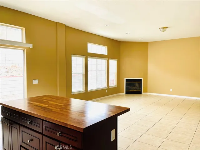 a view of kitchen with wooden floor and kitchen
