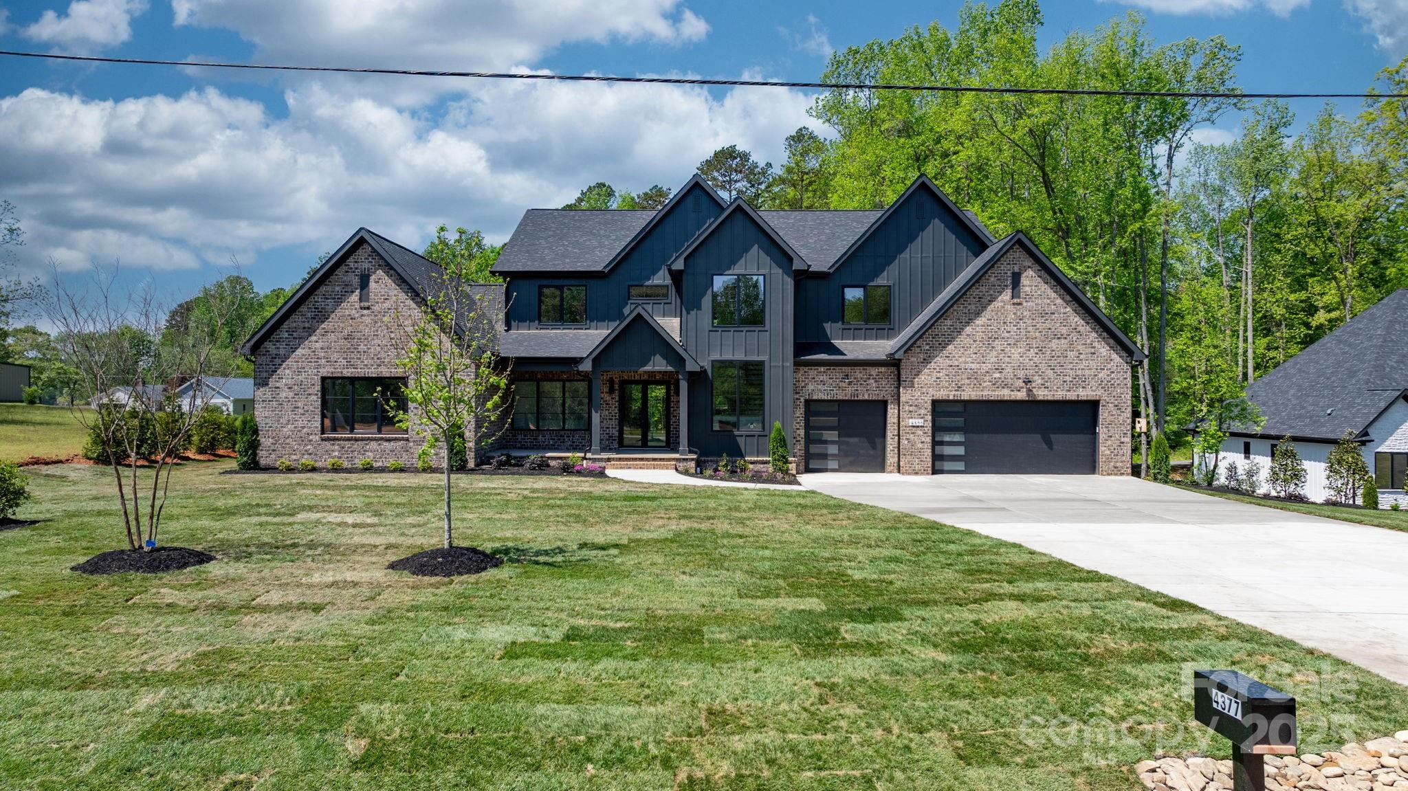 4377 Kiser Island Road Terrell, NC 28682 - Photo 1 of 47 a front view of a house with a garden
