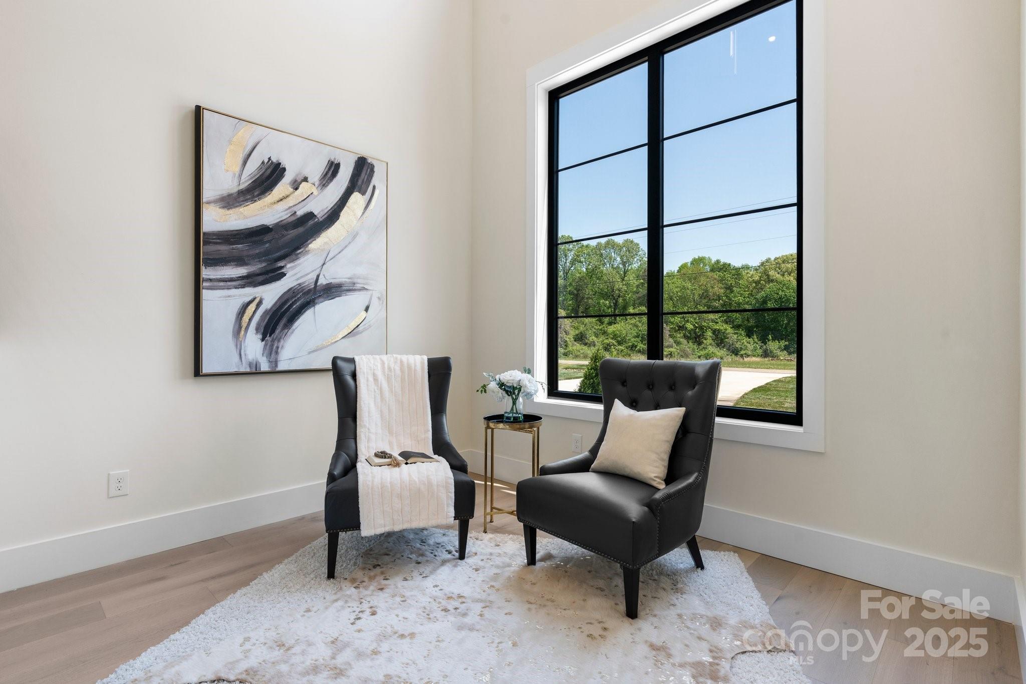 4377 Kiser Island Road Terrell, NC 28682 - Photo 11 of 47 a chair and a table in a room