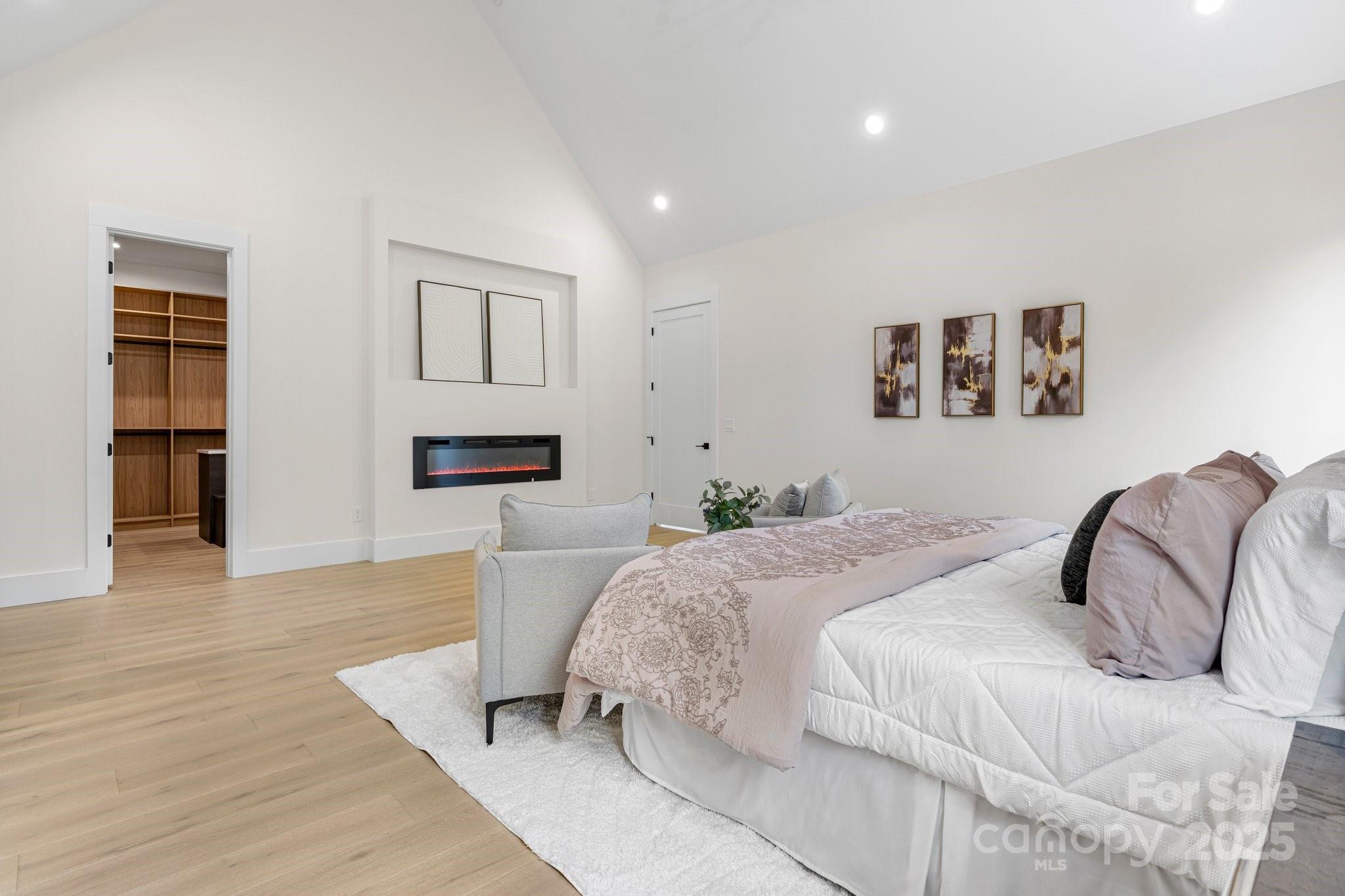4377 Kiser Island Road Terrell, NC 28682 - Photo 28 of 47 a bedroom with a bed and a couch