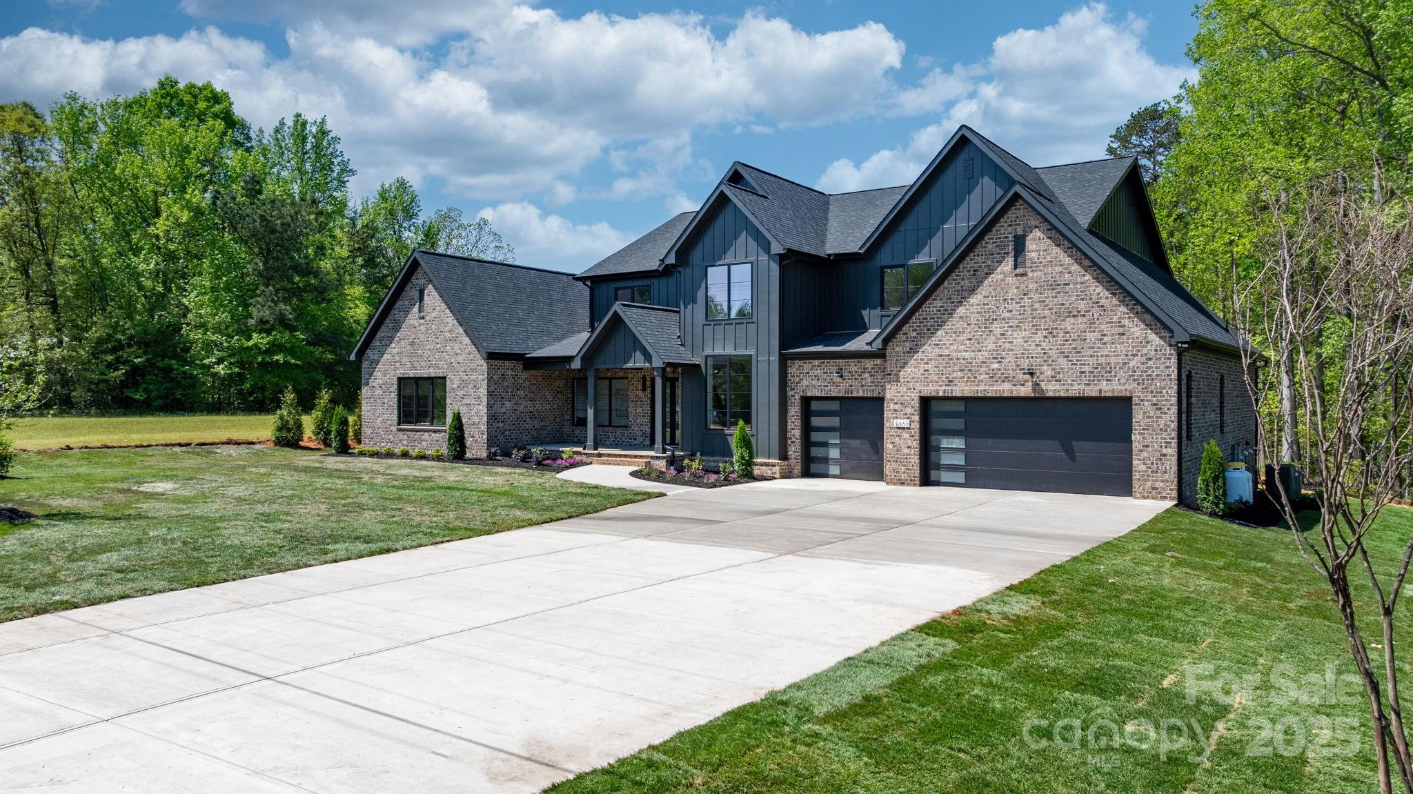4377 Kiser Island Road Terrell, NC 28682 - Photo 3 of 47 a front view of house with yard and green space