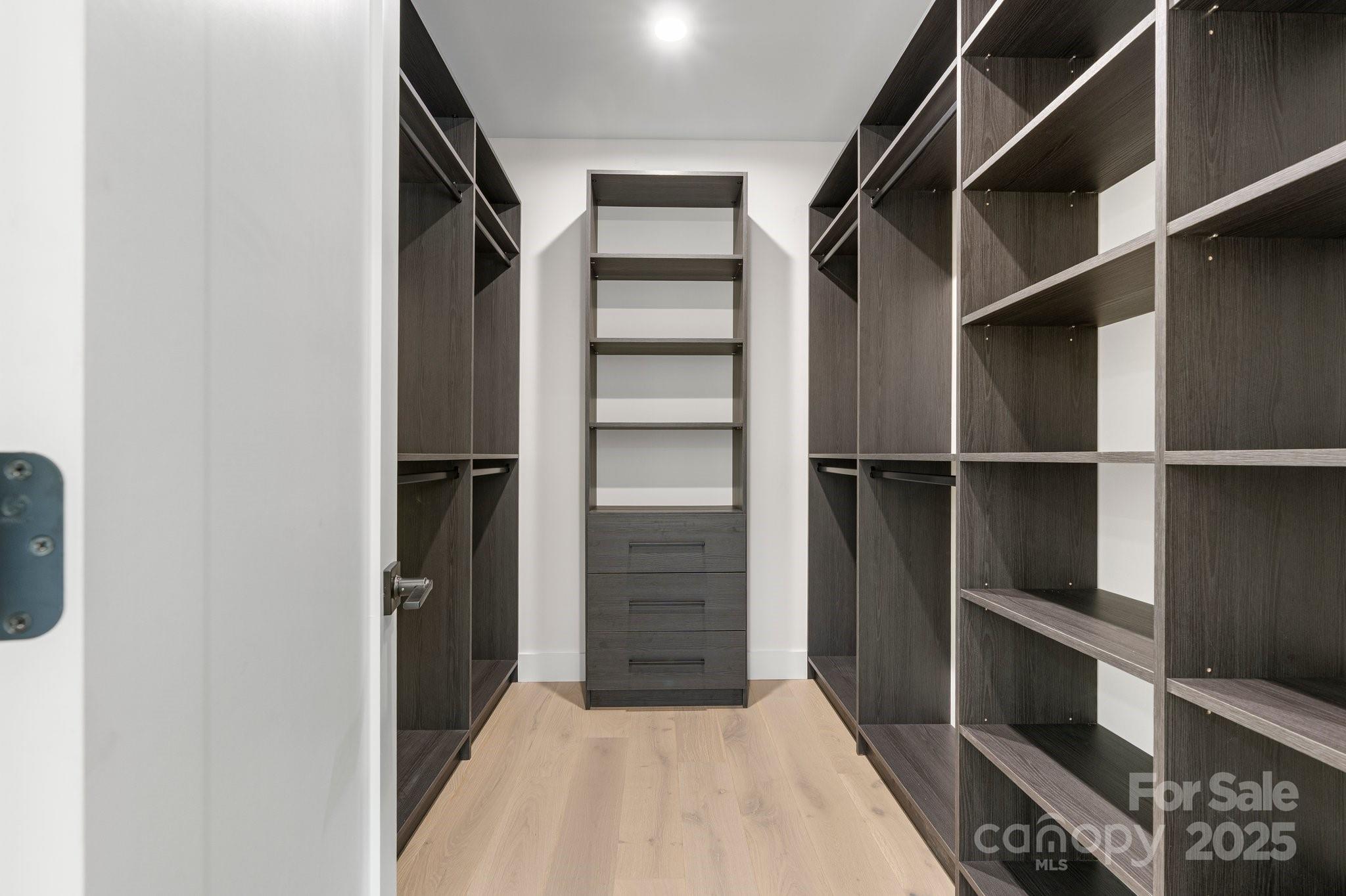4377 Kiser Island Road Terrell, NC 28682 - Photo 42 of 47 a view of walk in closet with empty racks