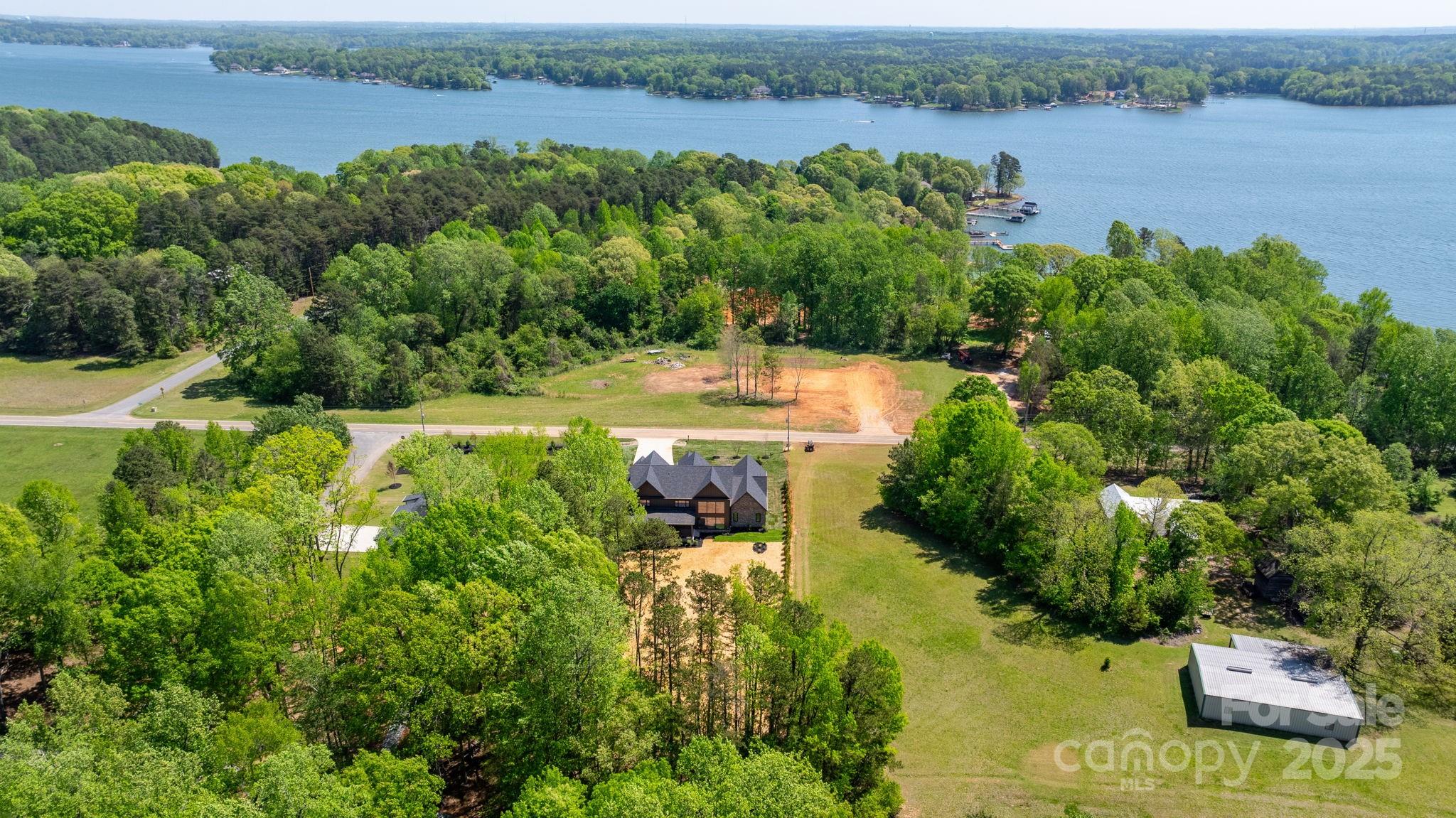4377 Kiser Island Road Terrell, NC 28682 - Photo 46 of 47 a view of a lake with houses in the back