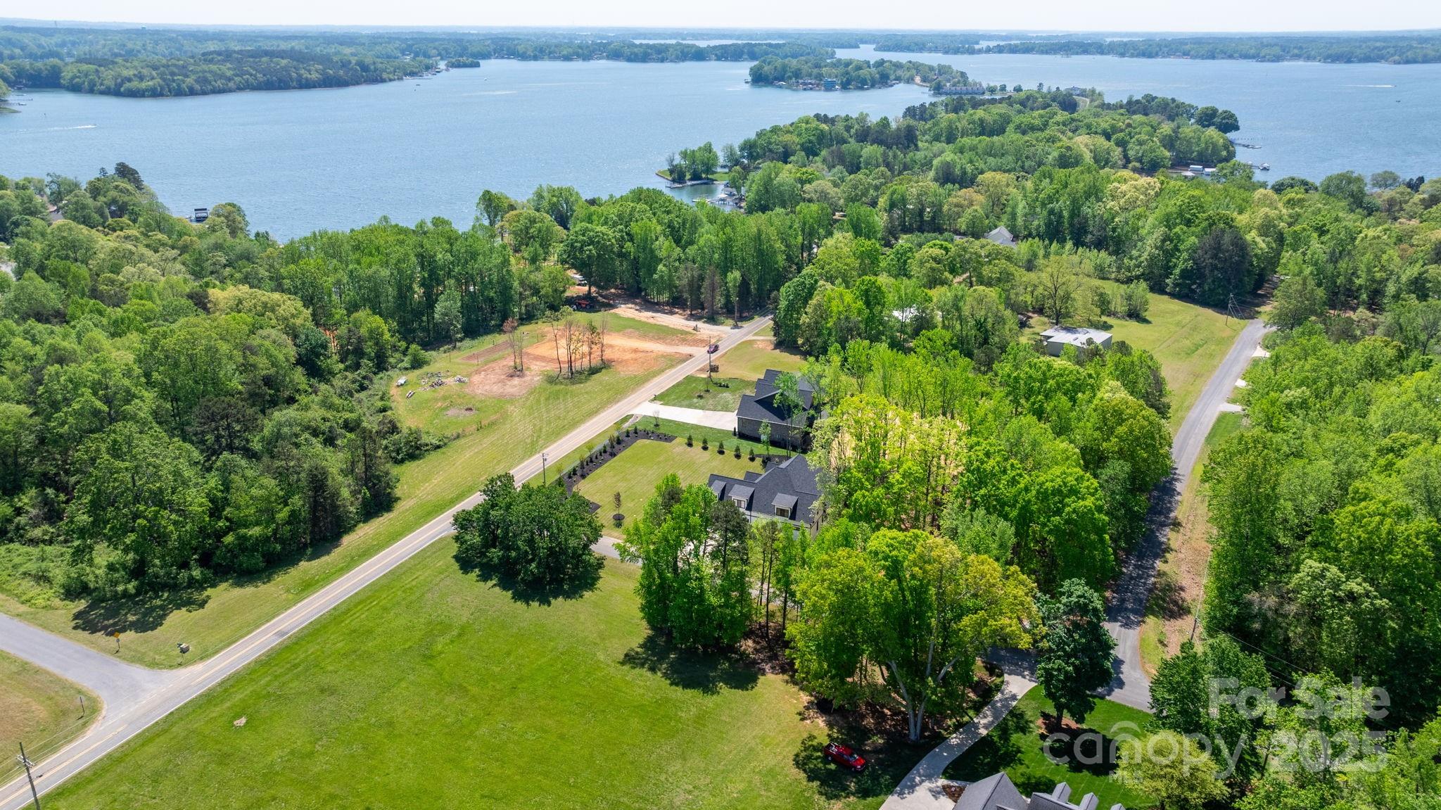 4377 Kiser Island Road Terrell, NC 28682 - Photo 47 of 47 an aerial view of a house with a yard and lake view