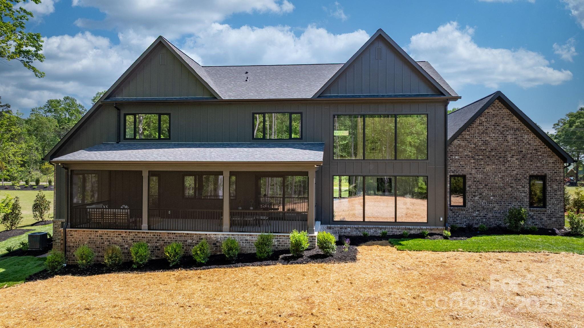 4377 Kiser Island Road Terrell, NC 28682 - Photo 6 of 47 a front view of a house with a yard and garage