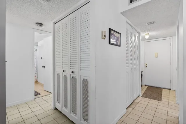 a kitchen with a sink cabinets and appliances