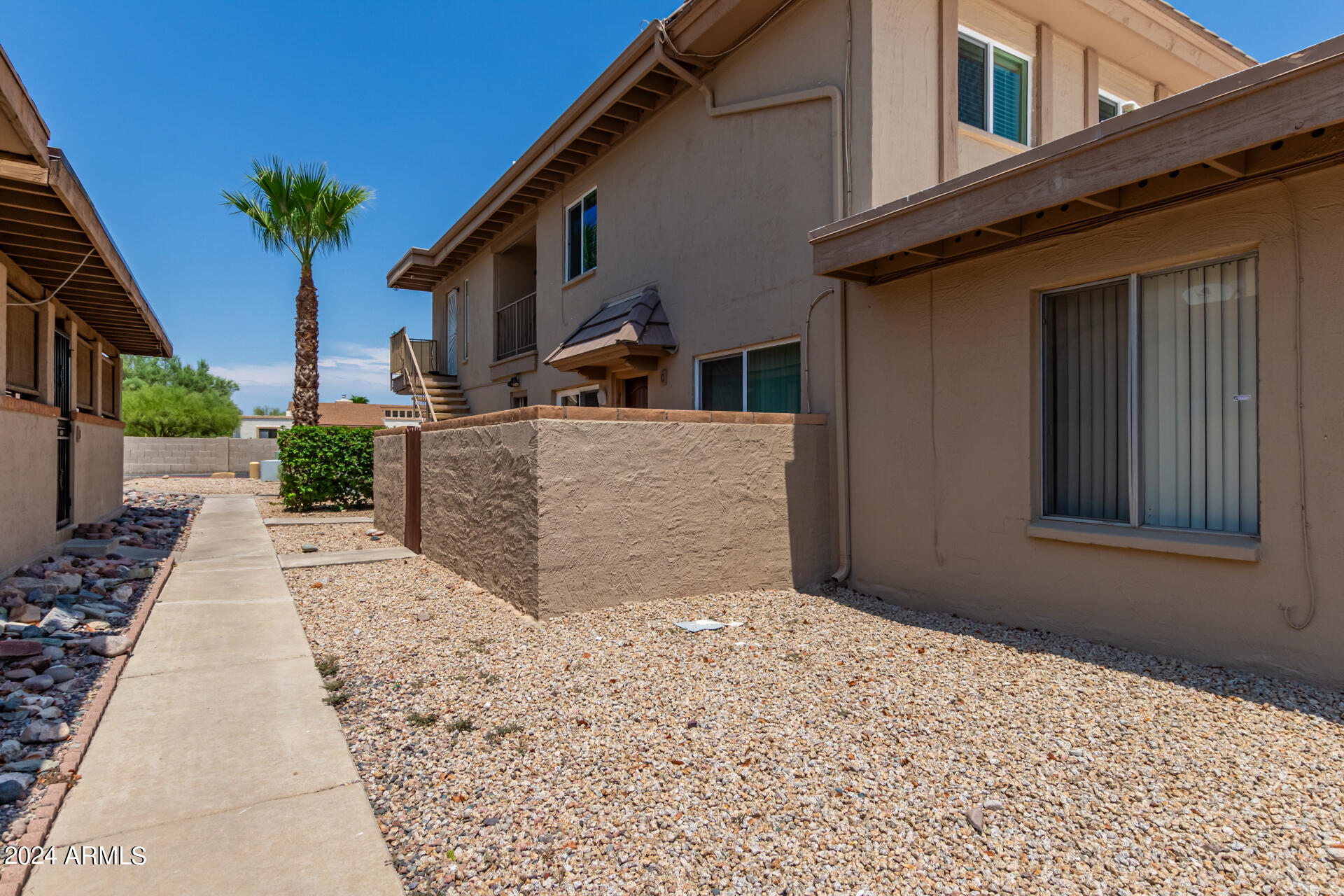 17034 East Calle Del Oro, Unit C Fountain Hills, AZ 85268 - Photo 2 of 22 a view of a backyard of the house