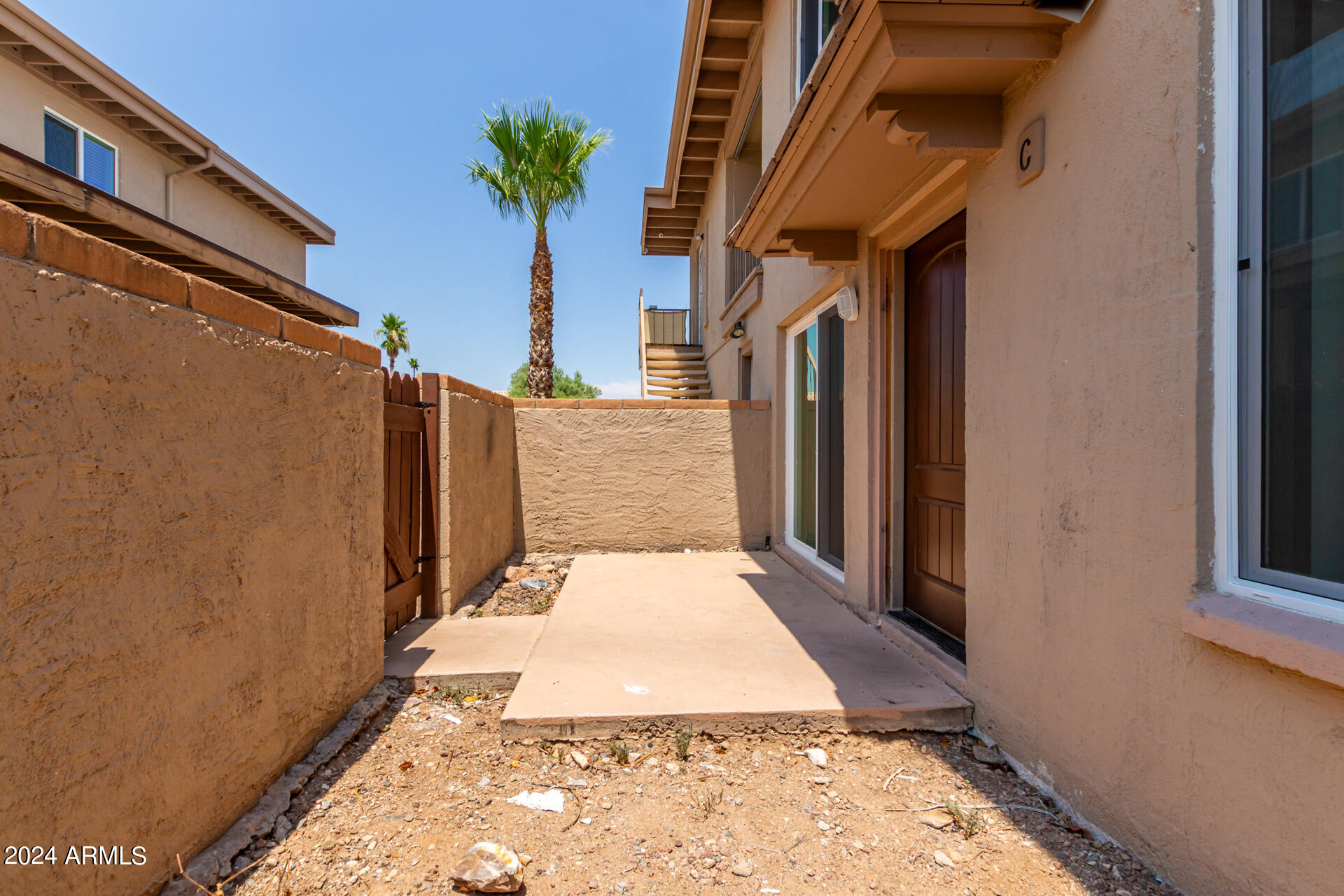 17034 East Calle Del Oro, Unit C Fountain Hills, AZ 85268 - Photo 5 of 22 a view of a pathway of house
