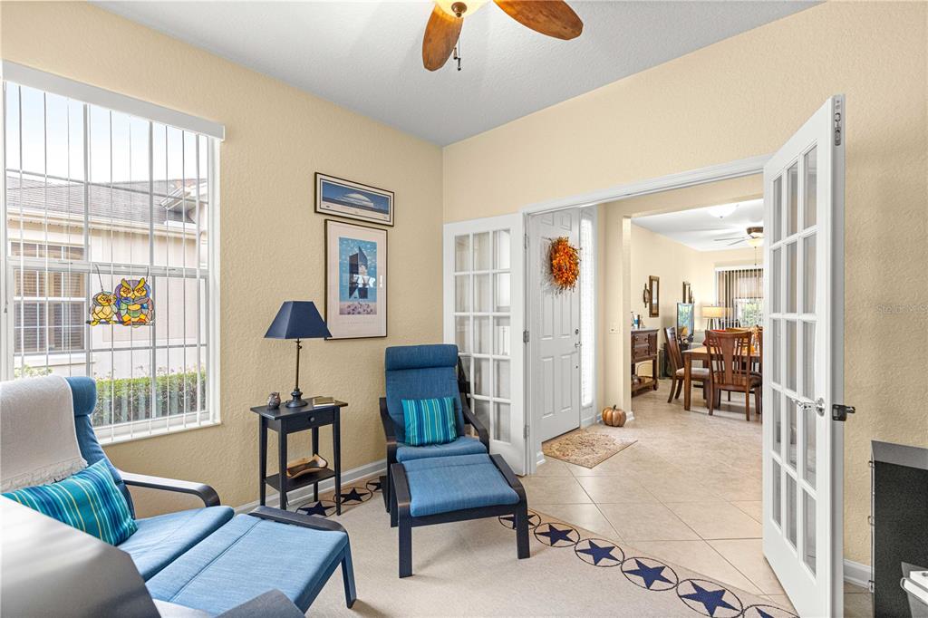 9566 Southwest 70th Loop Ocala, FL 34481 - Photo 17 of 53 a living room with furniture and a window