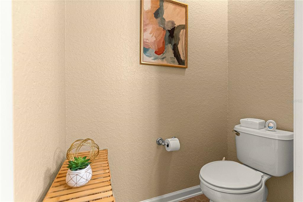 9566 Southwest 70th Loop Ocala, FL 34481 - Photo 28 of 53 a white toilet sitting next to a window