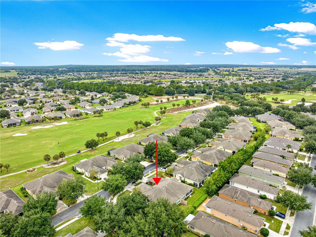 9566 Southwest 70th Loop Ocala, FL 34481 - Photo 42 of 53 a view of a city with an ocean